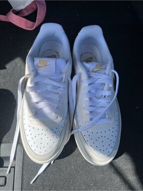 Nike Women’s White Sneakers with Gold Accents